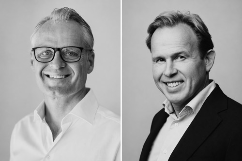 Mikael och Kristian ler in mot kameran